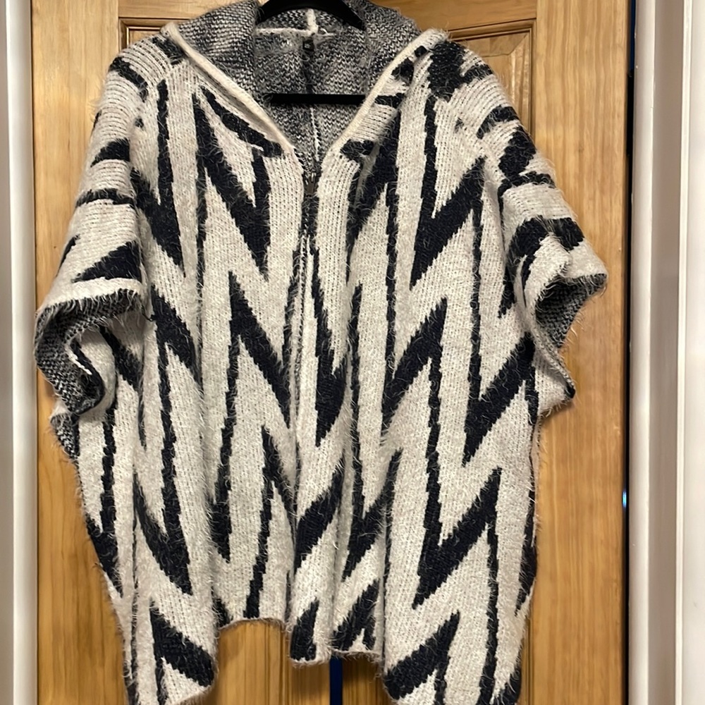 Elan, black and white, hooded poncho. One size